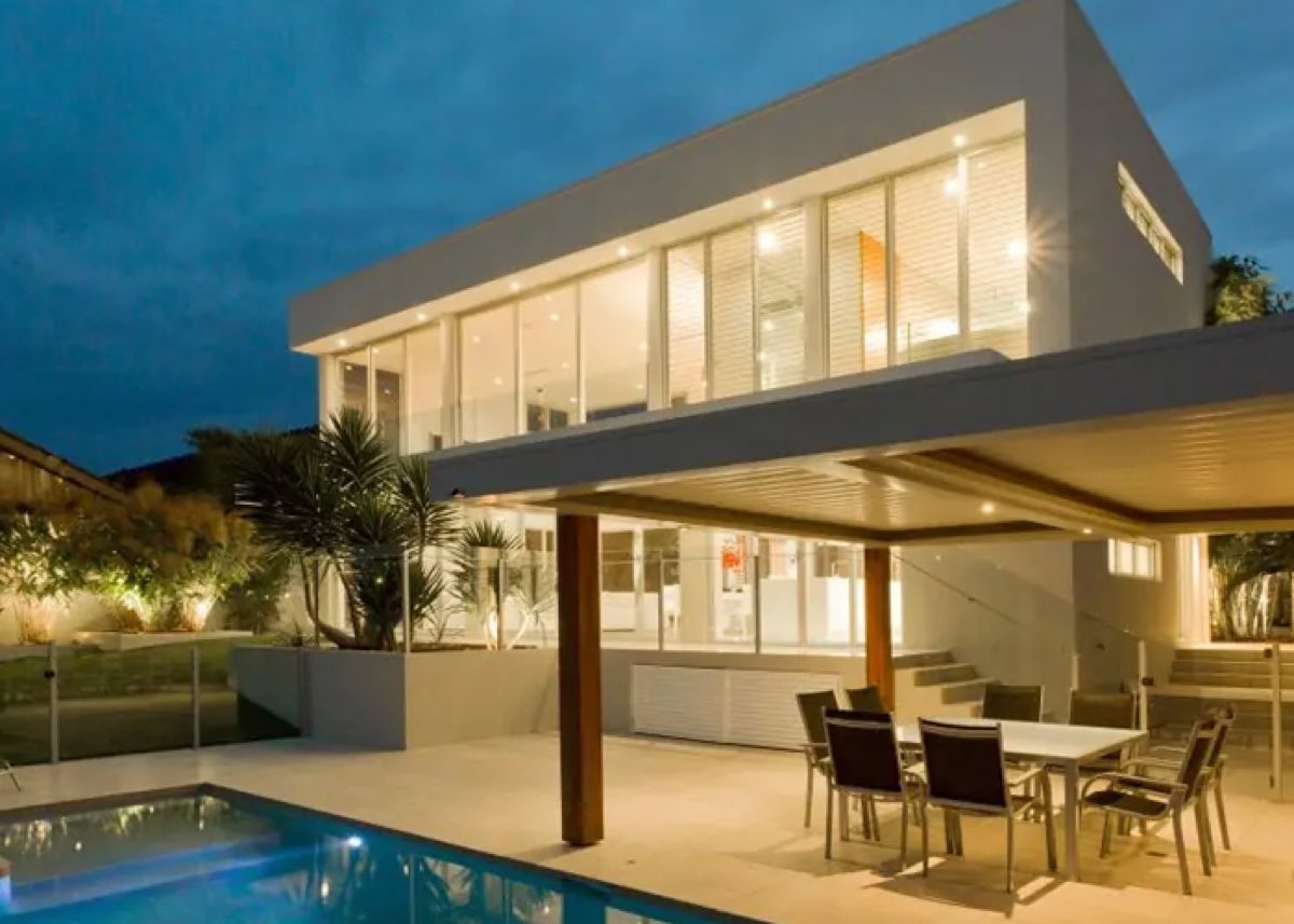 Modern home with poolside patio